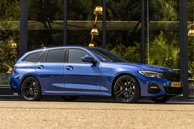 BMW 3-serie 3 Serie Touring 330d High Executive M-Pakk uit 2022