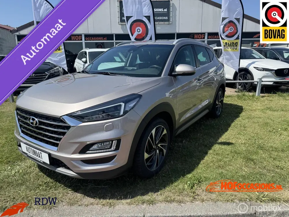 Hyundai Tucson 1.6 T-GDI 4WD Premium AUTOMAAT/CARPLAY/TREKHA uit 2019