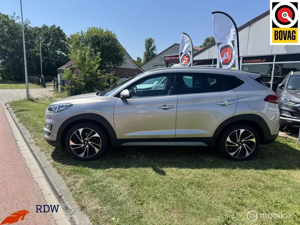 Hyundai Tucson 1.6 T-GDI 4WD Premium AUTOMAAT/CARPLAY/TREKHA uit 2019, foto 13