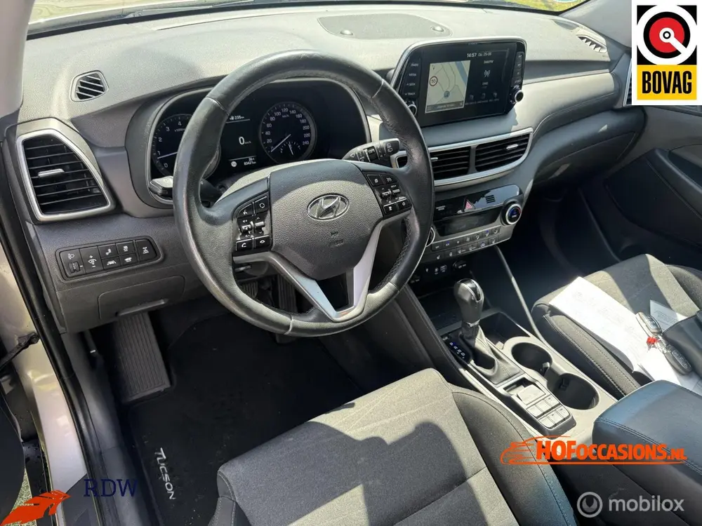 Hyundai Tucson 1.6 T-GDI 4WD Premium AUTOMAAT/CARPLAY/TREKHA uit 2019, foto 2