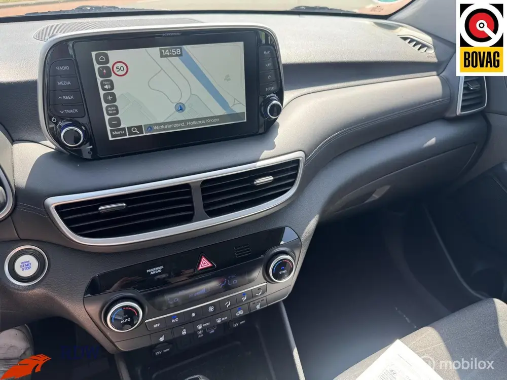Hyundai Tucson 1.6 T-GDI 4WD Premium AUTOMAAT/CARPLAY/TREKHA uit 2019, foto 20