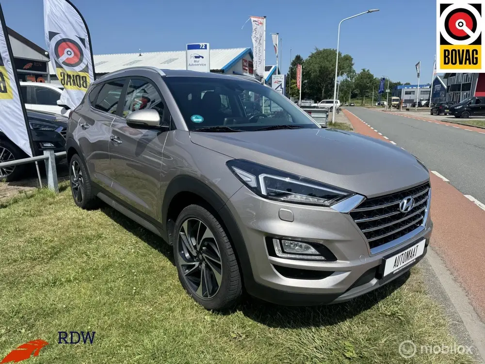 Hyundai Tucson 1.6 T-GDI 4WD Premium AUTOMAAT/CARPLAY/TREKHA uit 2019, foto 6