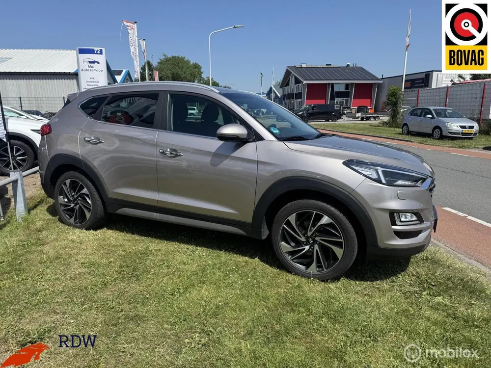 Hyundai Tucson 1.6 T-GDI 4WD Premium AUTOMAAT/CARPLAY/TREKHA uit 2019, foto 7