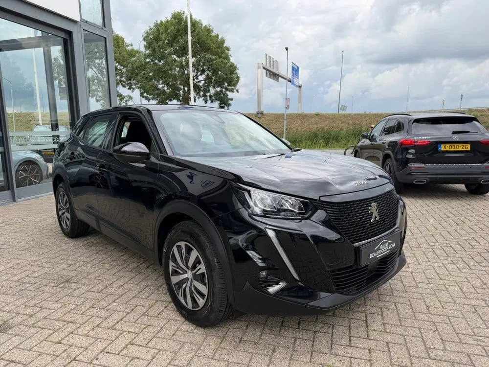 Peugeot 2008 1.2 PT BLUE LEASE ACTIVE NAVI AIRCO uit 2022, foto 11