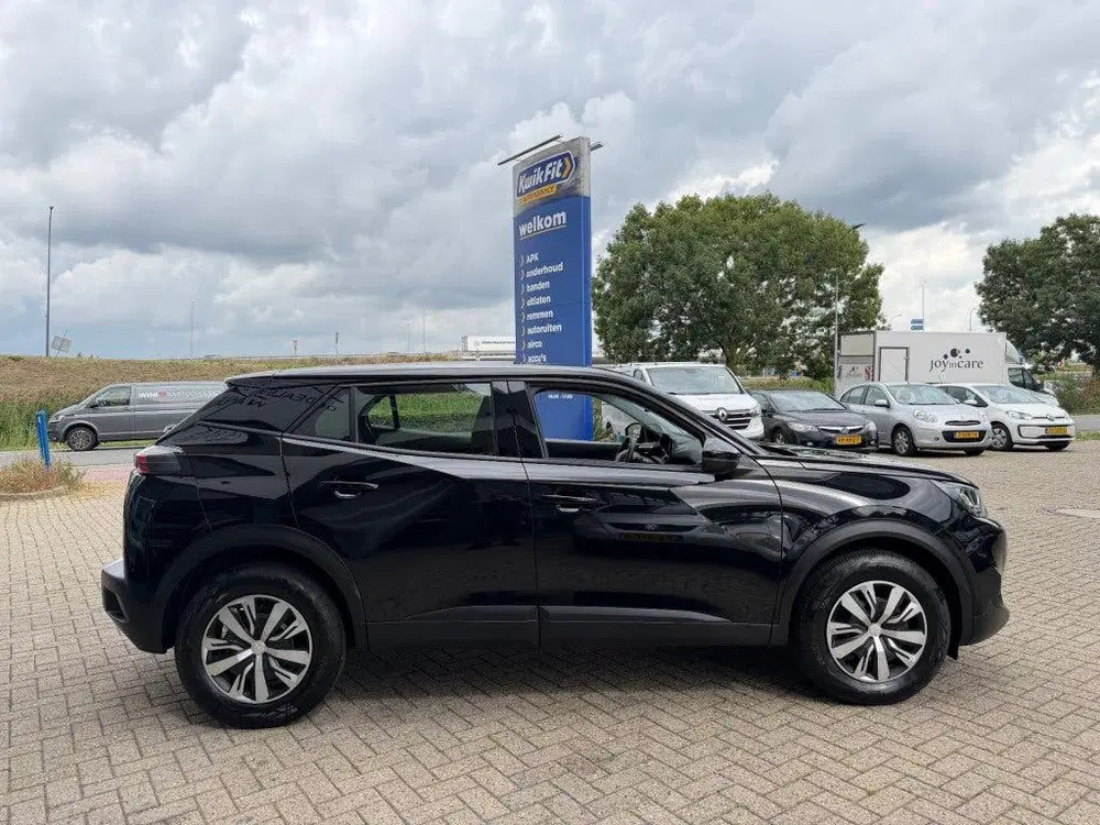 Peugeot 2008 1.2 PT BLUE LEASE ACTIVE NAVI AIRCO uit 2022, foto 16