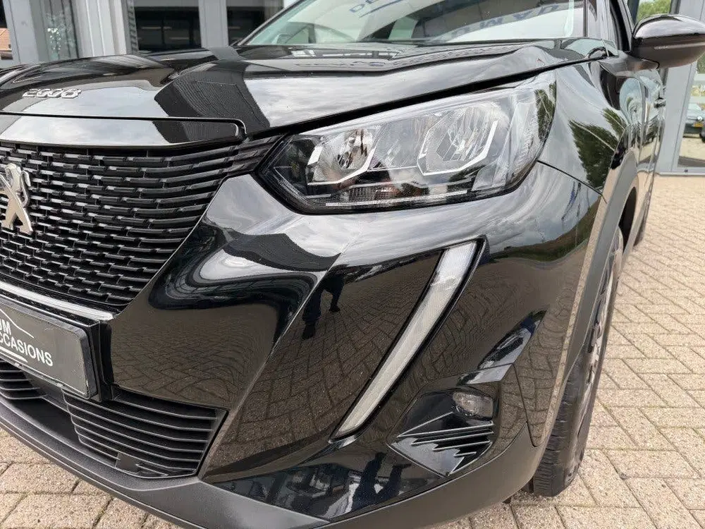 Peugeot 2008 1.2 PT BLUE LEASE ACTIVE NAVI AIRCO uit 2022, foto 19