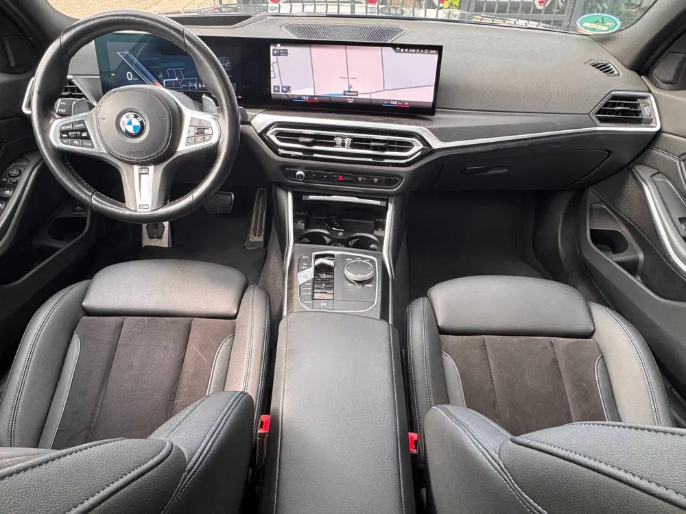BMW 3-serie 320i uit 2023, foto 17