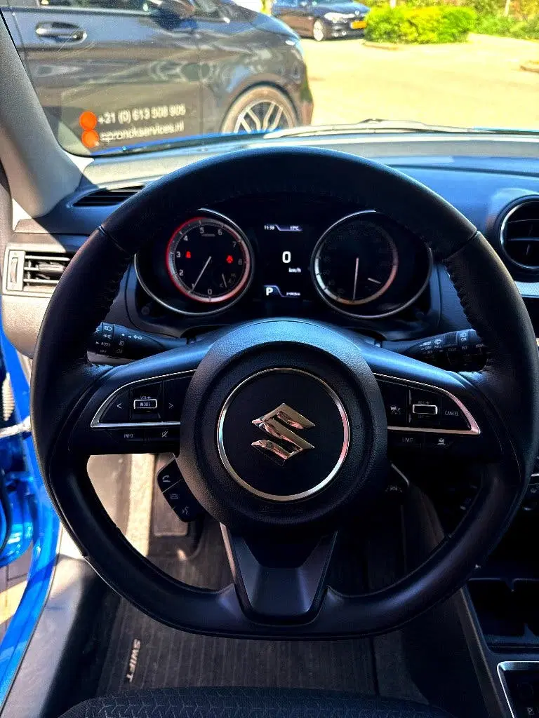 Suzuki Swift 1.2 AUTOM Smart Hybride Comfort uit 2024, foto 7