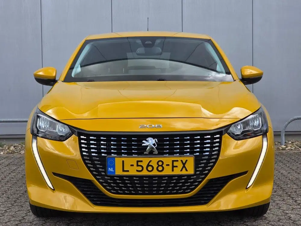 Peugeot 208 100pk Allure Navigatie uit 2021, foto 2