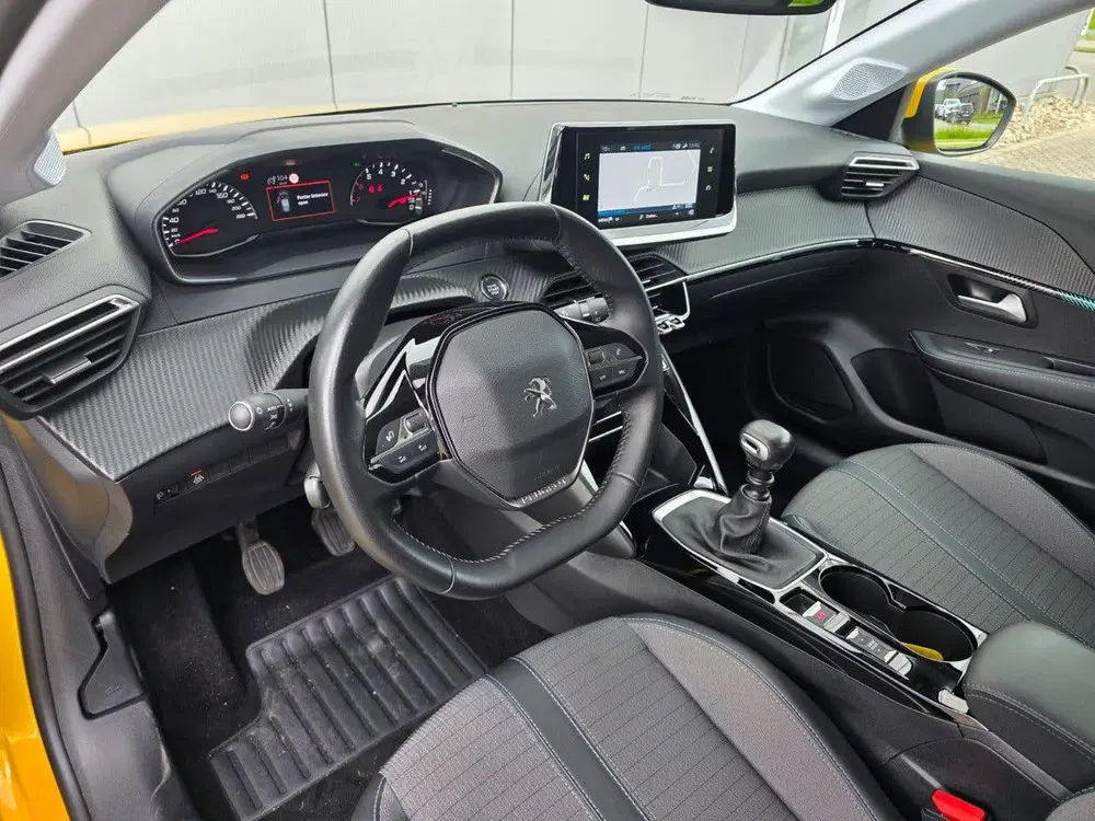 Peugeot 208 100pk Allure Navigatie uit 2021, foto 8