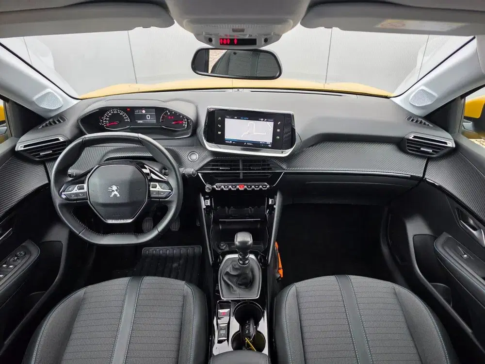 Peugeot 208 100pk Allure Navigatie uit 2021, foto 9