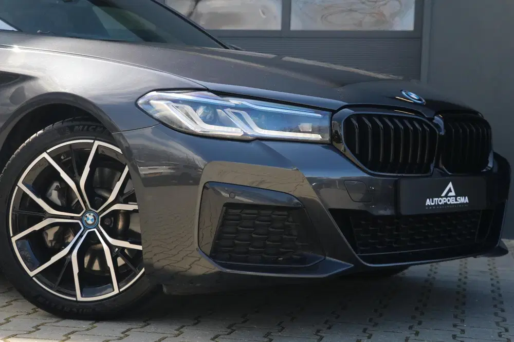BMW 5-serie 530e uit 2024, foto 7