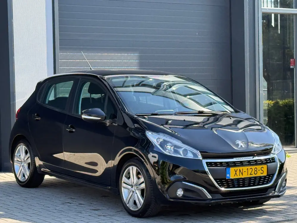 Peugeot 208 1.2 PureTech Signature / LAGE KM / NAP / CARPLAY uit 2019, foto 9