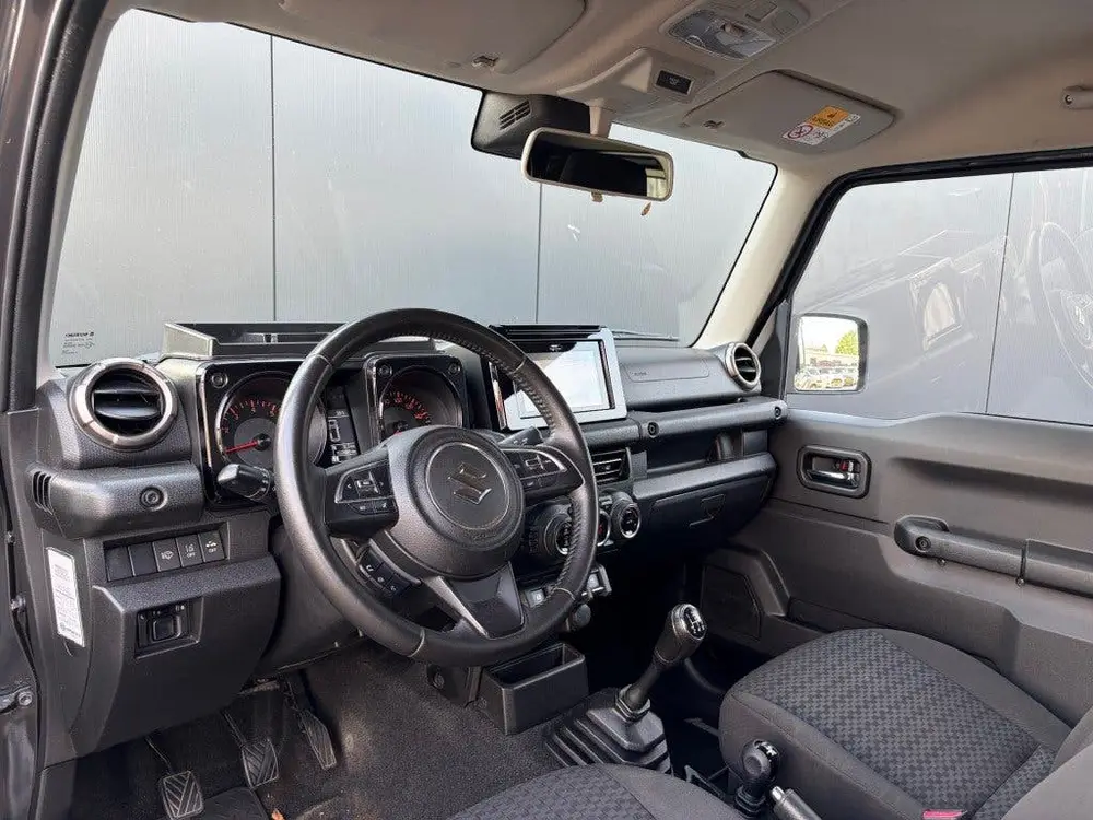 Suzuki Jimny 1.5 AllGrip Comfort+ 4-zits LED Navi Cruis uit 2020, foto 15