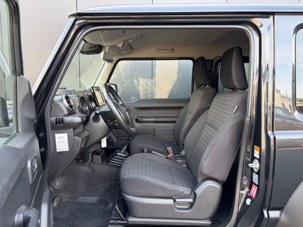 Suzuki Jimny 1.5 AllGrip Comfort+ 4-zits LED Navi Cruis uit 2020, foto 16