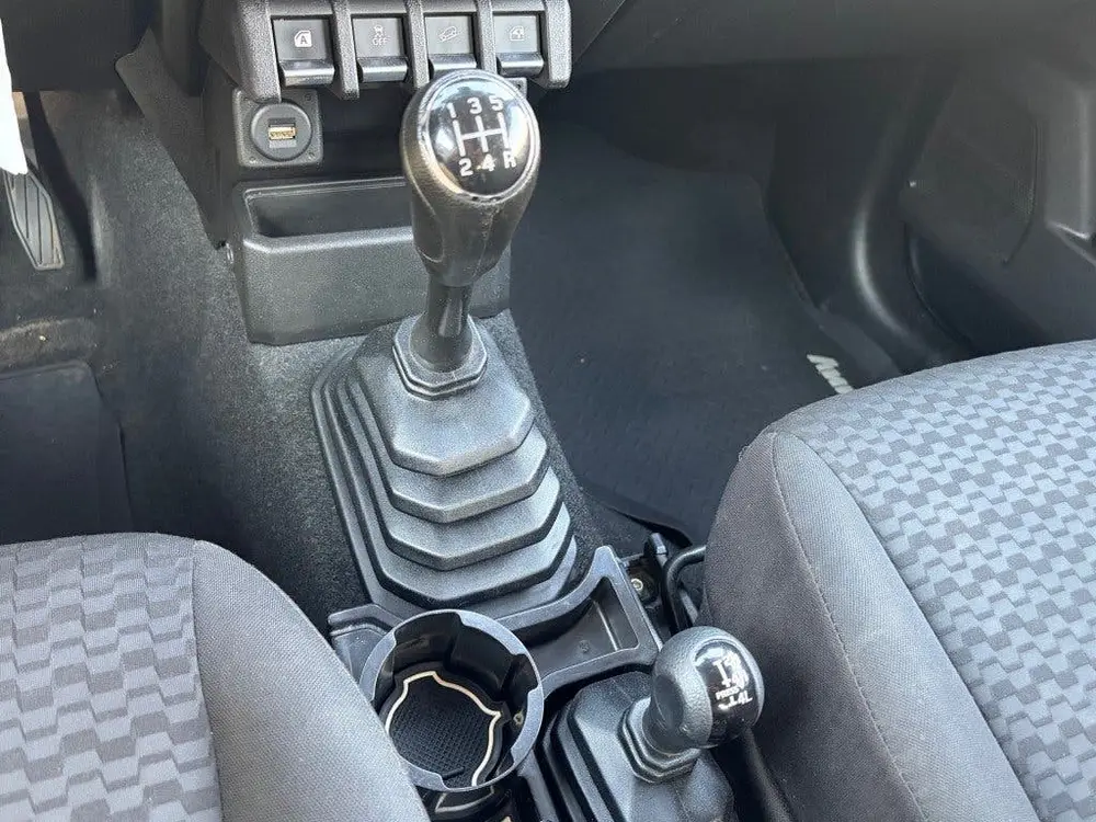 Suzuki Jimny 1.5 AllGrip Comfort+ 4-zits LED Navi Cruis uit 2020, foto 9