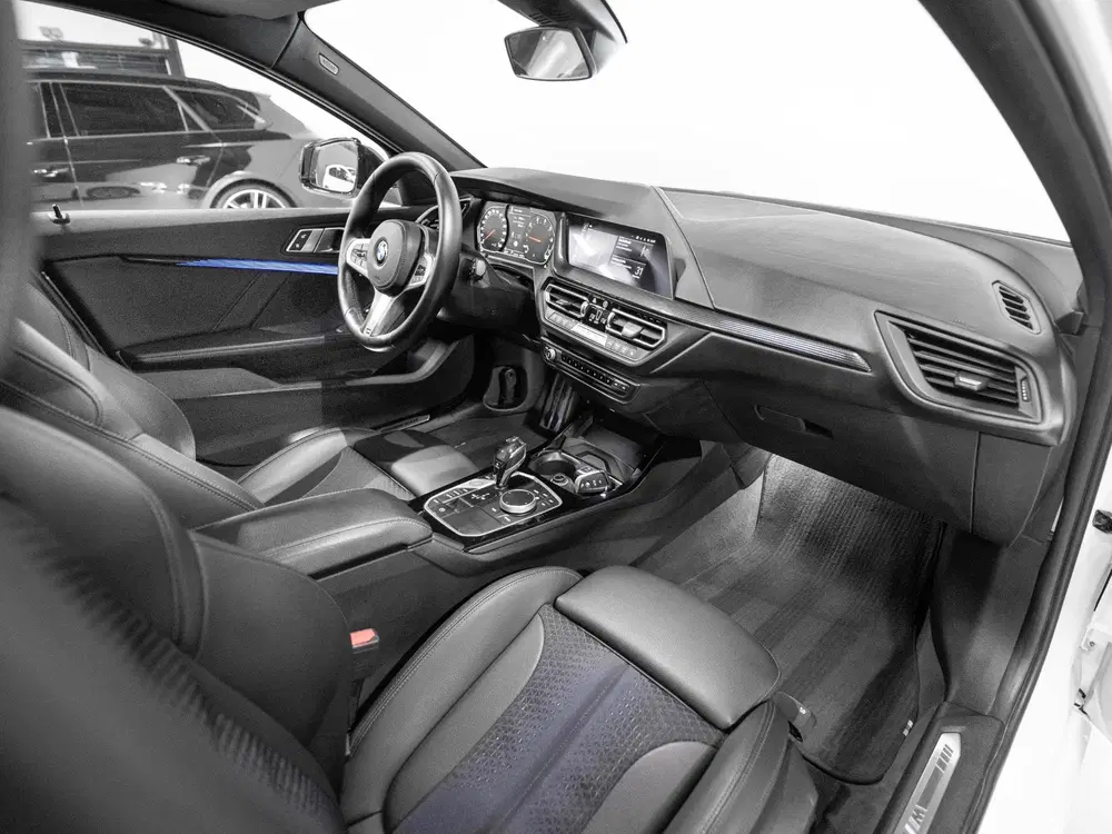BMW 1-serie 118i High Executive M-Pakket Stoelv Cam Cr uit 2020, foto 12