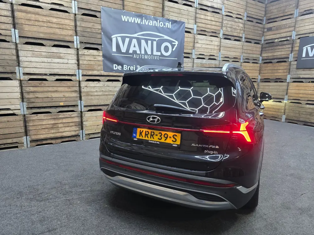 Hyundai SANTA FE 1.6 T-GDI PHEV Premium Sky 7p. Leder Pano uit 2023, foto 19