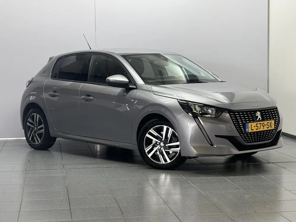 Peugeot 208 1.2 PureTech Allure Pack Navigatie uit 2021, foto 4