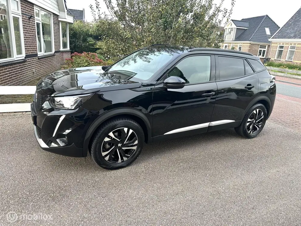 Peugeot 2008 EV Allure Pack 50 kWh CARPLAY ACHTERUITRIJ uit 2021, foto 2