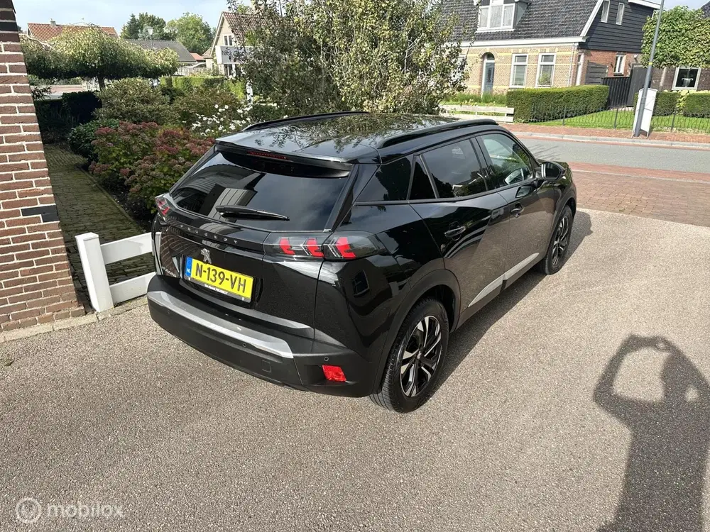 Peugeot 2008 EV Allure Pack 50 kWh CARPLAY ACHTERUITRIJ uit 2021, foto 4