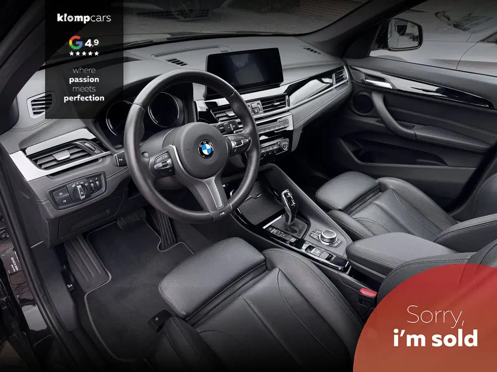 BMW X1 xDrive20i M-Sportstuur uit 2019, foto 4