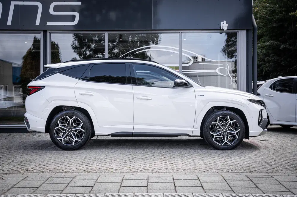Hyundai TUCSON 1.6 T-GDI HEV Premium uit 2021, foto 11