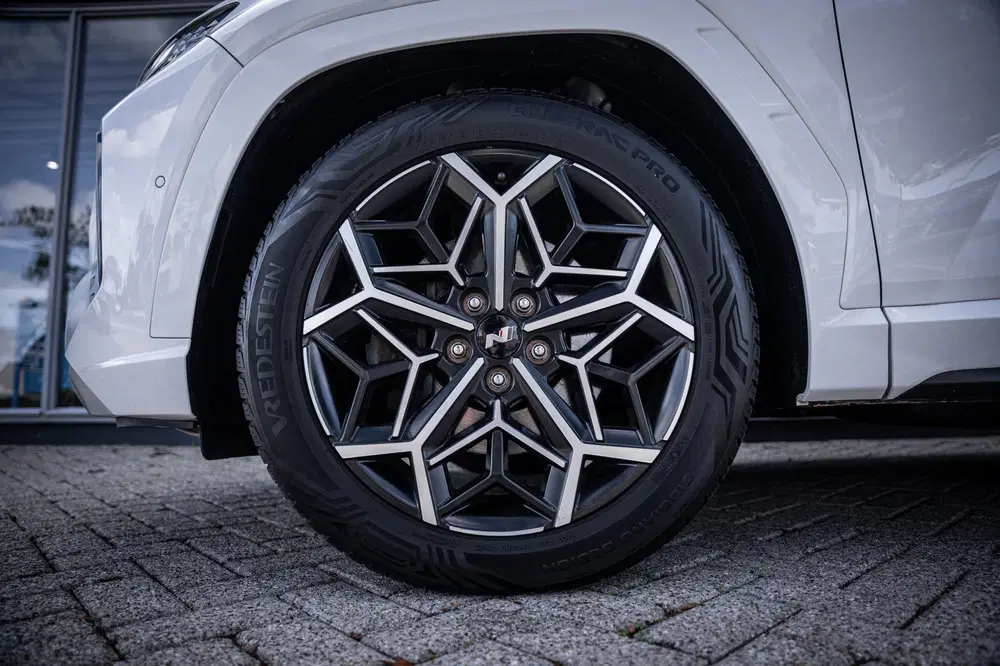 Hyundai TUCSON 1.6 T-GDI HEV Premium uit 2021, foto 7