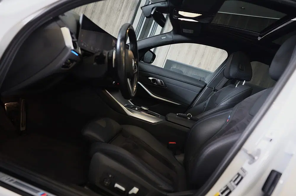 BMW 3-serie 320e M Line uit 2022, foto 9