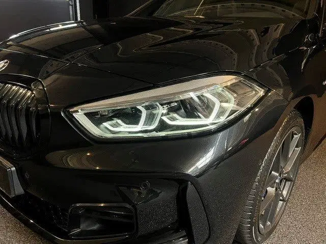 BMW 1-serie 118i High Executive Edition M Pano uit 2020, foto 12