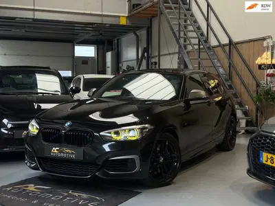 BMW 1-serie M140i xDrive High Executive Harman uit 2019