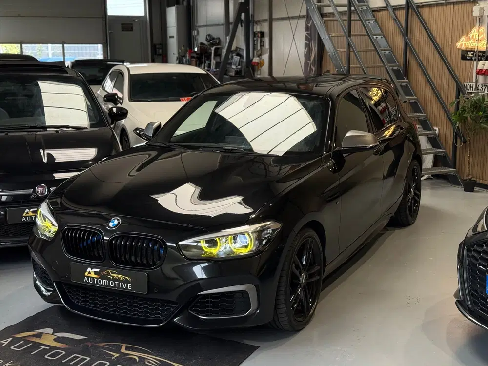 BMW 1-serie M140i xDrive High Executive Harman uit 2019, foto 2