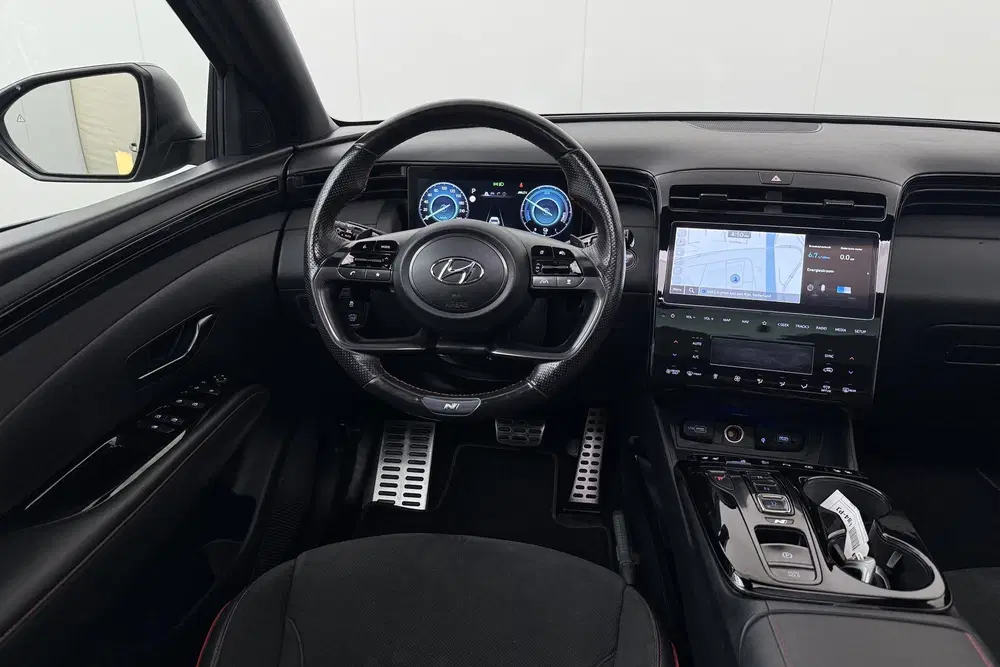 Hyundai TUCSON 1.6 180 PK T-GDI HEV N-Line Sky Pano Trekh uit 2022, foto 11