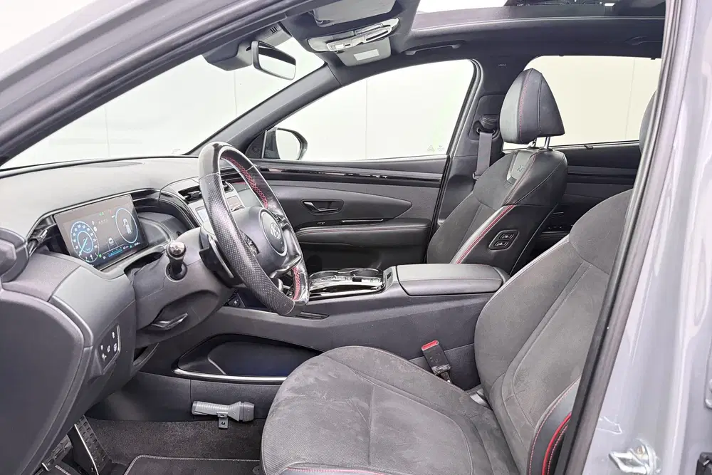 Hyundai TUCSON 1.6 180 PK T-GDI HEV N-Line Sky Pano Trekh uit 2022, foto 13