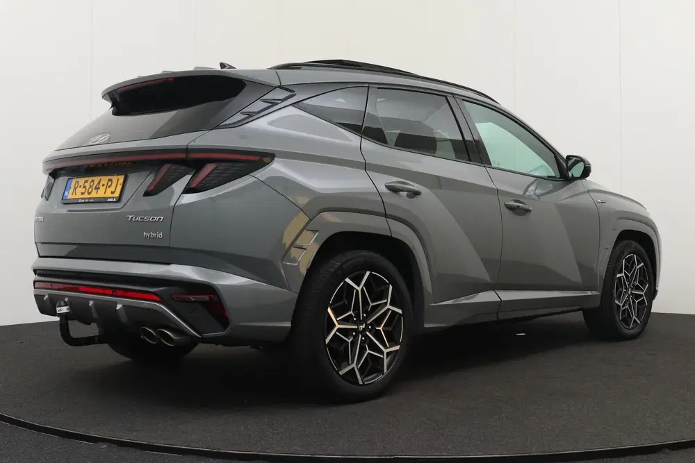 Hyundai TUCSON 1.6 180 PK T-GDI HEV N-Line Sky Pano Trekh uit 2022, foto 2