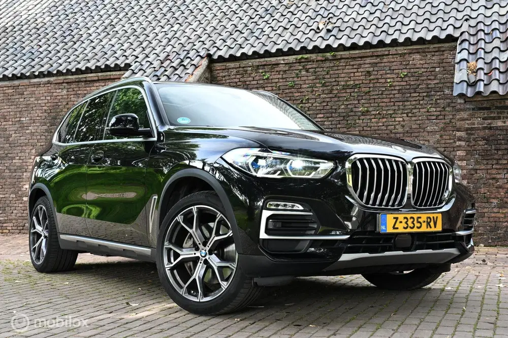 BMW X5 xDrive45e High Executive 12 maanden garant uit 2020