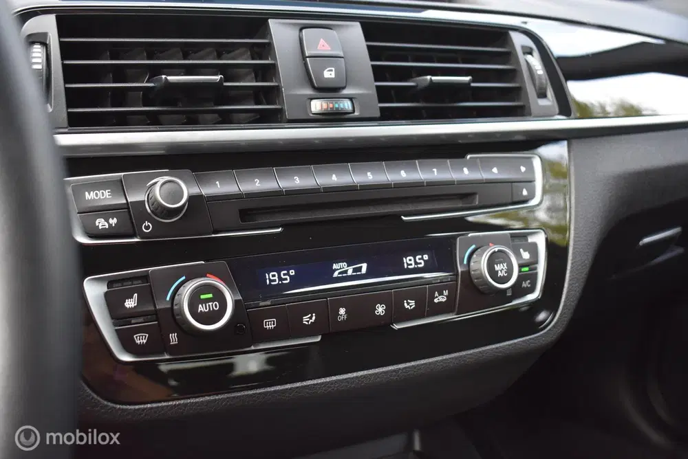 BMW 1-serie 118i Sport Line Clima Cruise Navi 17'' LMV uit 2019, foto 8