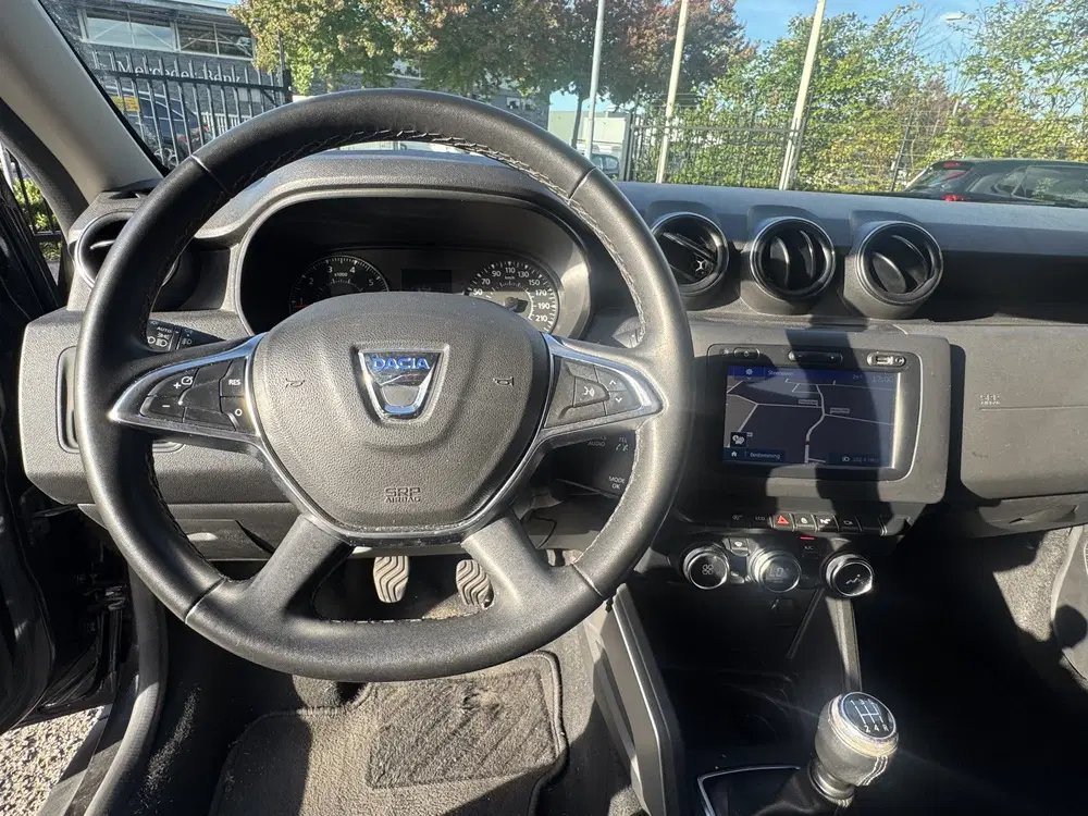 Dacia Duster 1.6 SCe Prestige uit 2019, foto 14