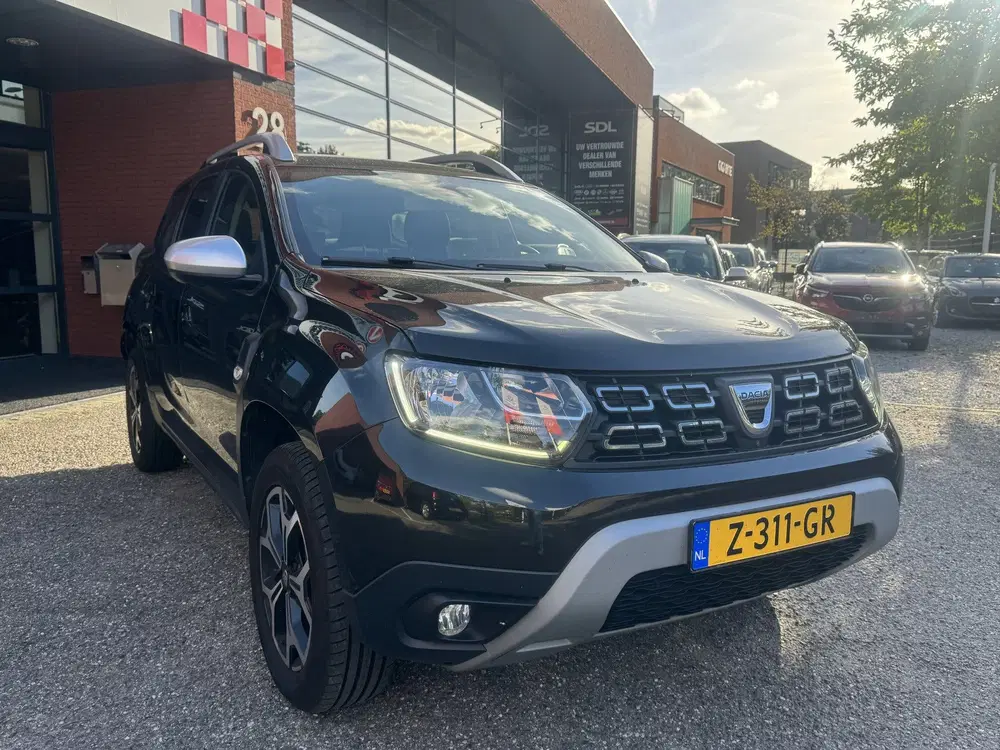Dacia Duster 1.6 SCe Prestige uit 2019, foto 3