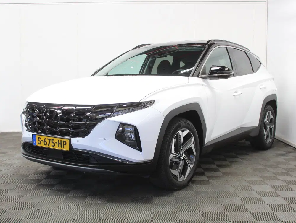 Hyundai TUCSON 1.6 T-GDI PHEV Comfort Smart 4WD CARPLAY uit 2023, foto 11