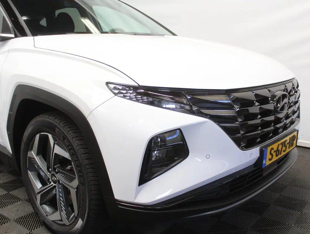 Hyundai TUCSON 1.6 T-GDI PHEV Comfort Smart 4WD CARPLAY uit 2023, foto 13