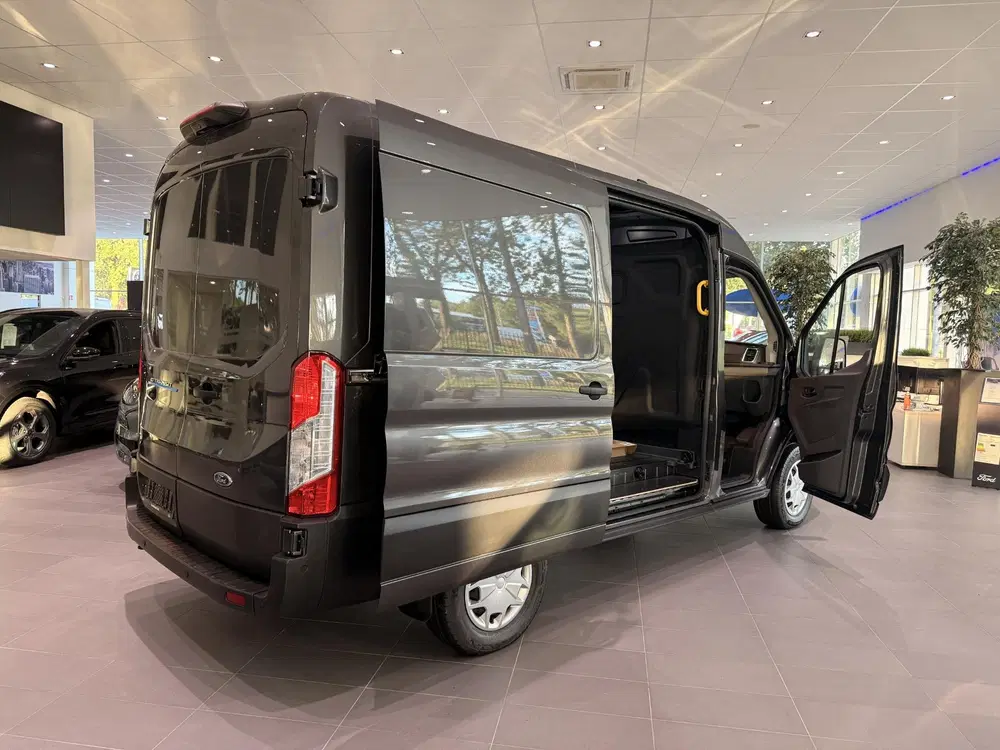 Ford Transit 350 L2H2 Trend 68 kWh 25KM auto niet gebru uit 2024, foto 11