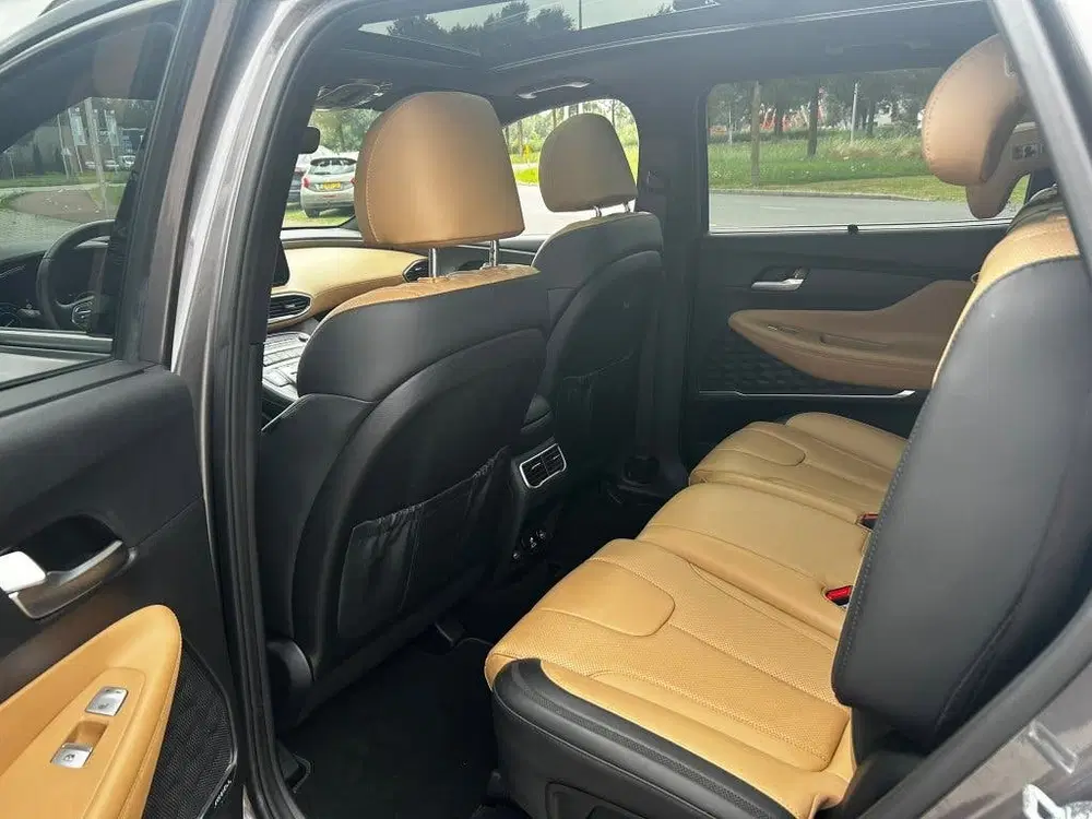 Hyundai SANTA FE 1.6 T-GDI HEV Premium Plus Sky 7p. uit 2023, foto 7