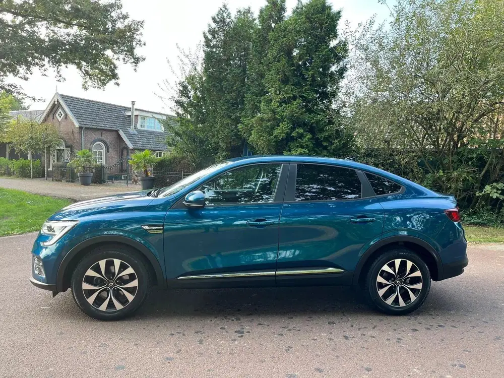 Renault Arkana 1.6 E-Tech Hybrid 145 Intens Camera uit 2021, foto 14
