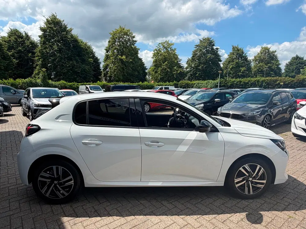 Peugeot 208 1.2 PureTech Allure Pack Airco Cruise Navi uit 2023, foto 15