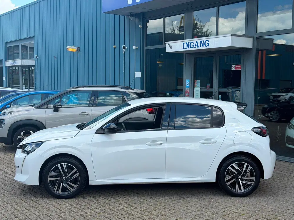 Peugeot 208 1.2 PureTech Allure Pack Airco Cruise Navi uit 2023, foto 4