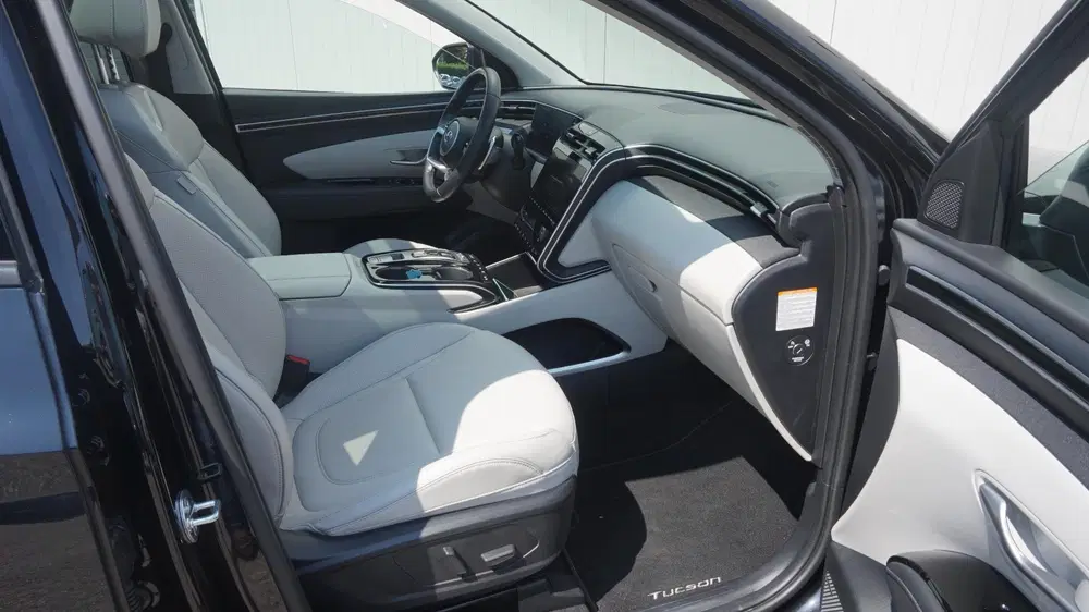 Hyundai TUCSON 1.6 T-GDI HEV Premium Sky Panoramadak uit 2023, foto 13