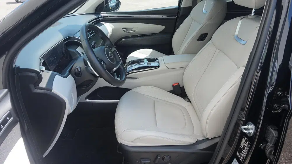 Hyundai TUCSON 1.6 T-GDI HEV Premium Sky Panoramadak uit 2023, foto 9