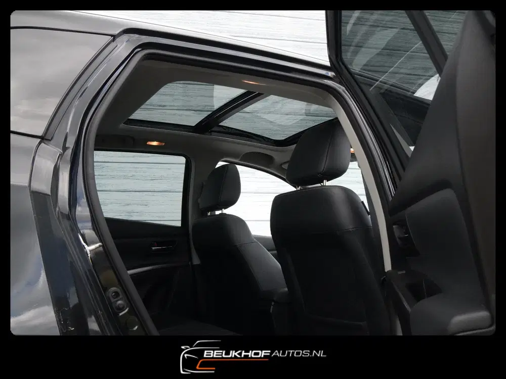 Suzuki S-Cross 1.4 Boosterjet Style Smart Hybrid Pano Lee uit 2022, foto 7