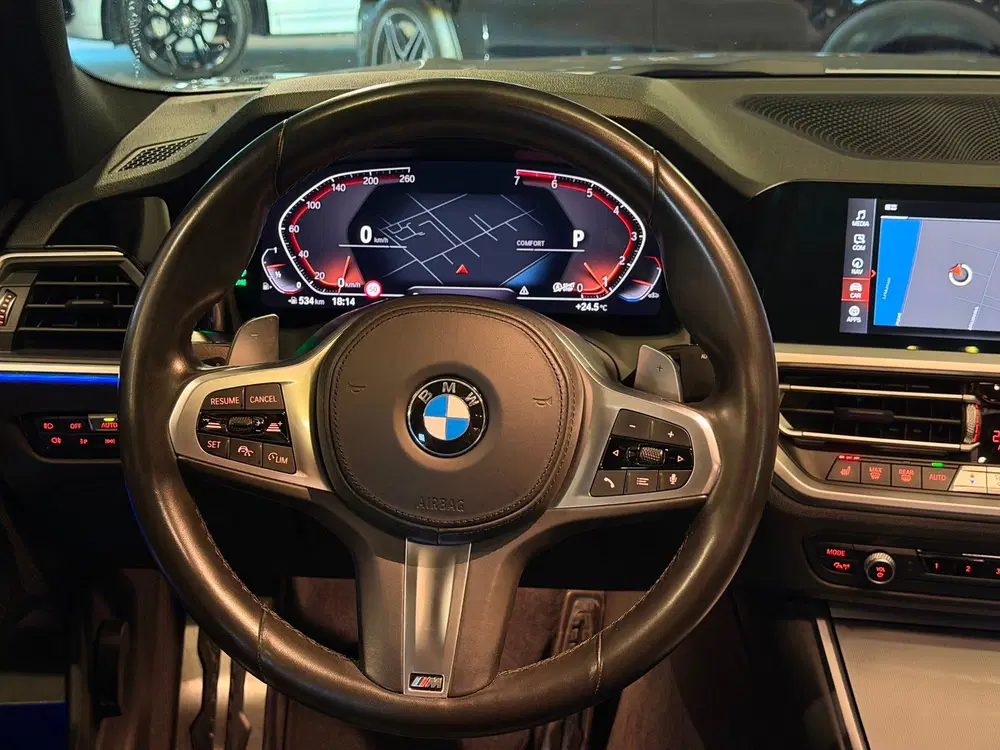 BMW 3-serie 320i High Executive uit 2020, foto 12